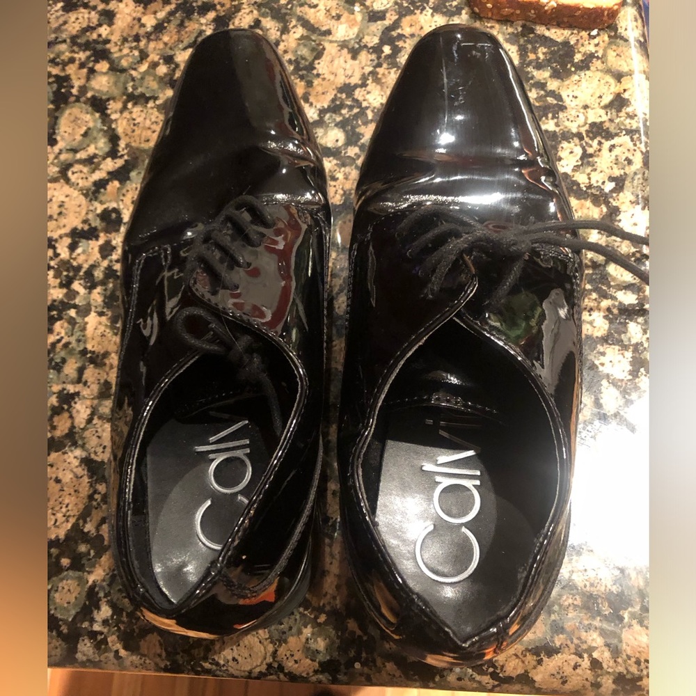 Calvin Klein mens patent black 7 1/2 shoe…worn in showroom almost new